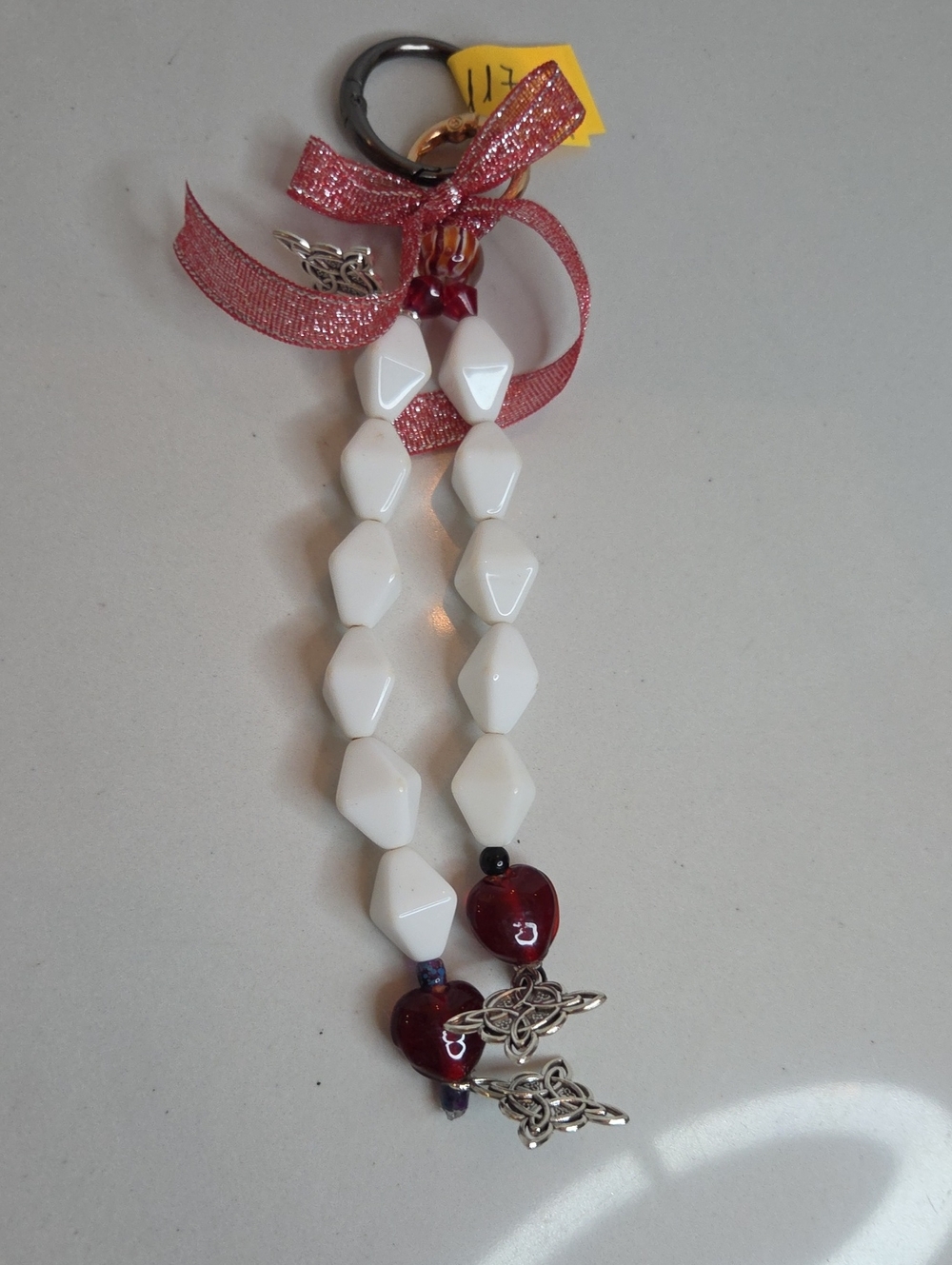 117 -Stone Handmade White Bead and Red Bag Charm